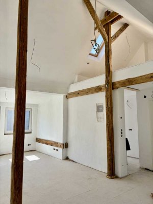 Erstbezug: Sonniges & attraktives DG mit 4,6 m Deckenhöhe