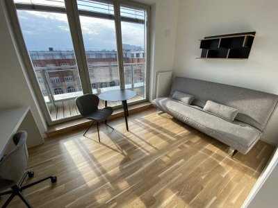 Möbliertes 1-Zimmer-Apartment im DG mit Klimaanlage und Blick zum Innenhof
