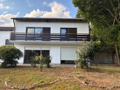 Charmantes Einfamilienhaus mit Garten und altem Baumbestand