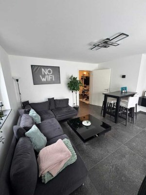 Moderne 2-Zimmer-Wohnung mit Balkon und eigenem Gartenanteil