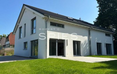 Neubau: Attraktive Doppelhaushälfte in zentraler Lage Oytens
