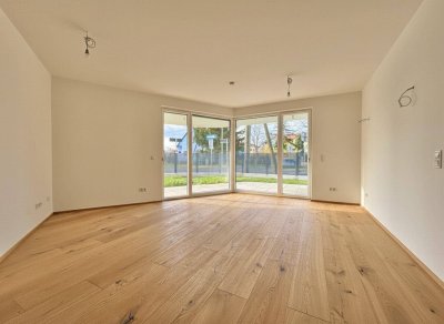 Preisreduktion &amp; Tiefgaragen-Stellplatz geschenkt! | 47m² Südwest-Terrasse | ERSTBEZUG | viel Freiraum und einzigartige Architektur