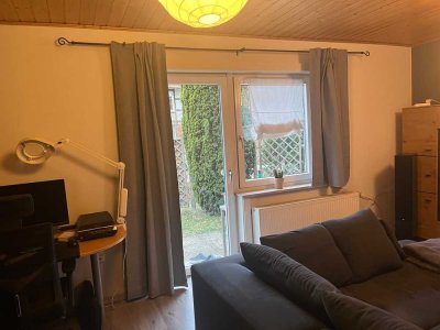 2-Zi EG-Wohnung mit eigenem Garten und Terrasse + Garage und Stellplatz