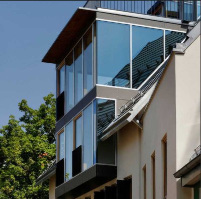 Besondere Maisonette-Wohnung mit großer Dachterrasse + Stellplatz
