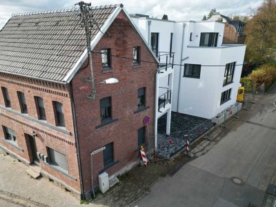 Wohnen mit Geschichte – Modernes Apartment im historischen Gebäudeensemble