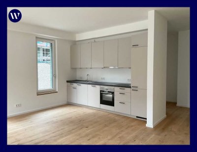 Terrassenwohnung im Neubau: 2 Zimmer mit viel Platz, Einbauküche, Parkett,Tageslichtbad, Abstellraum