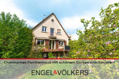 Ruhig & zentrumsnah: Charmantes Familienhaus mit schönem Garten zum Sanieren!