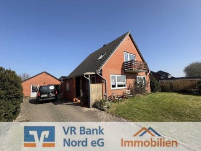 Einfamilienhaus mit Produktions- und Lagerfläche sowie Garage in attraktiver Lage