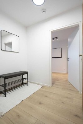 Frisch modernisiert! 2-Zimmer-Wohnung mit Balkon & Tiefgarage in der Stadtmitte