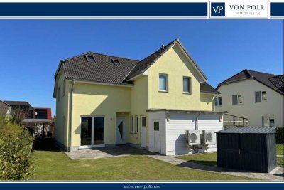 Energieklasse A+: Neuwertiges Zweifamiliehaus mit Ausbaureserven