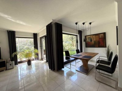 Erdgeschosswohnung mit großem Wohnbereich und Terrasse in Müngersdorf