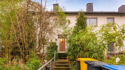Charmantes Reihenmittelhaus mit Garten, Terrasse und kleiner Garage in familienfreundlicher Lage