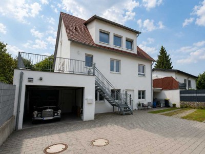 Neuwertiges Einfamilienhaus mit Einliegerwohnung und schönem Garten | KfW 55 | Wärmepumpe