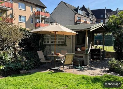 Stadtwohnung mit Garten, Garage und Wellnessbereich