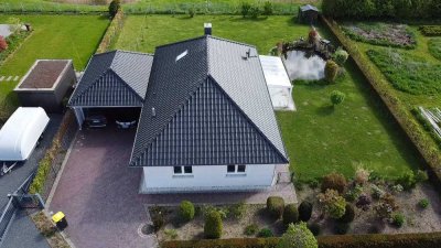 Traumlage mit Kanalblick - Einfamilienhaus mit Garten und offenem Wintergarten