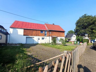 Einfamilienhaus mit großzügiger Scheune und vielseitigen Nutzungsmöglichkeiten in 56459 Guckheim