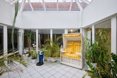 Lichtdurchfluteter Bungalow mit Atrium – barrierefreies Wohnjuwel mit vielfältigem Raumangebot