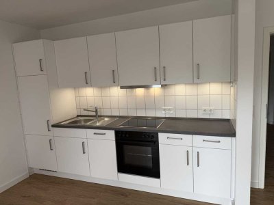 Bezugsfreie Single-Wohnung mit Südbalkon, neuer Einbauküche und Stellplatz