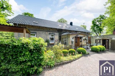 Investition mit Wohnkomfort: Gepflegtes Mehrfamilienhaus mit 4 Einheiten und idyllischem Garten i...