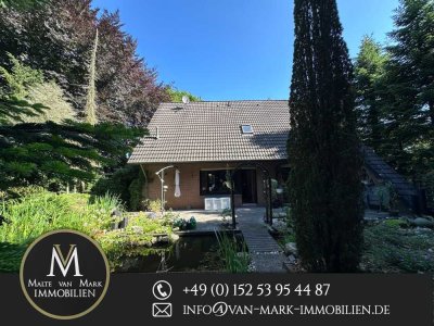 Charmantes Einfamilienhaus mit großem Garten, Teich, Terrasse und Kamin in ruhiger Lage von Hesel!