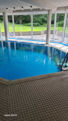 Hochwertig renoviertes 1-Zimmer-Apartment | Schwimmbad, Sauna & Panoramablick inklusive