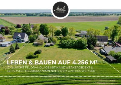 Wohnen & Bauen auf 4.256 m² – Feldrandlage mit Handwerkerobjekt & separater Bauoption in Seenähe