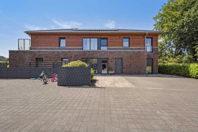 Ansprechende 2-Zimmer-Terrassenwohnung mit gehobener Innenausstattung mit Einbauküche in Sittensen