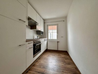 Charmante Dachgeschoßwohnung im Zentrum von Petttenbach.