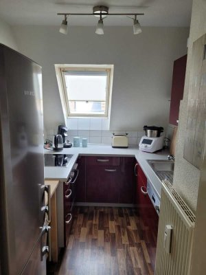 Traumhafte Dachgeschosswohnung mit 2,5 Zimmern und Balkon