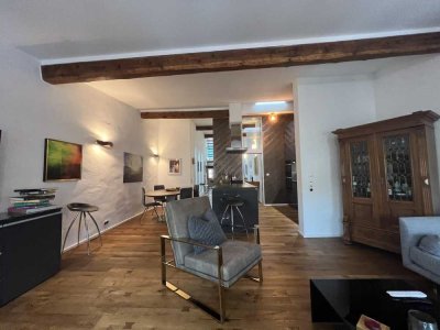 Urbanes Wohnerlebnis über zwei Ebenen – Stilvolle Loftwohnung mit Dachterrasse und Weitblick!