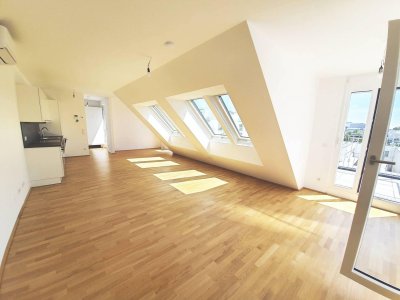 Moderne 3-Zimmer-Dachgeschosswohnung mit fünf Terrassen –klimatisiert – in der Koloniestraße!
