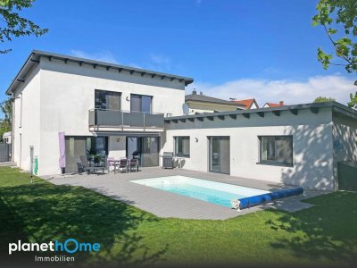 Luxuriöses Wohnen mit Einliegerwohnung, Pool und beeindruckendem Naturflair