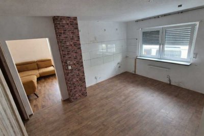 Doppelhaushälfte in Mannheim-Rheinau – 360 m² Grundstück, Partyraum und viel Entwicklungspotenzial