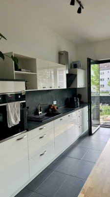 Nachmieter gesucht – moderne 2-Zimmer-Wohnung mit Garten, Einbauküche & Tiefgaragenstellplatz