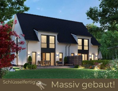 Massives individuelles Reihenendhaus mit Dachgaube – zeitloser Wohnstil in geräumigen Zimmern“