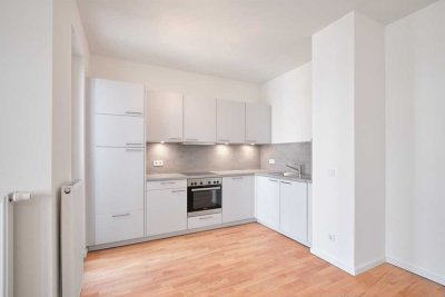 Moderne 2-Zimmerwohnung mit Einbauküche und großzügigem Balkon.