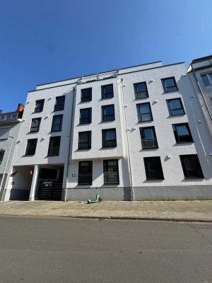 Helle Drei-Zimmer Wohnung mit Einbauküche und Balkon in ruhiger Lage nahe dem Zentrum