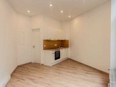 Zentrales Einzimmer-Apartment mit Küchenzeile in der Augsburger Innenstadt zu vermieten!