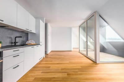 ERSTBEZUG - Helle 2-Zimmer-Dachgeschoßwohnung mit Loggia