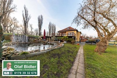 RENDITEOBJEKT MIT POTENZIAL IN BIEDERITZ – VERMIETETE GASTRONOMIE + WOHNHAUS AUF GROSSEM GRUNDSTÜCK