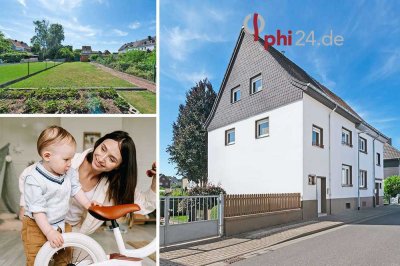 PHI AACHEN - Wohlfühlhaus mit viel Potenzial und großem Grundstück in beliebter Lage von Linnich!