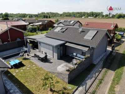 Design trifft See: Exklusive Mini-Villa mit Wellness & Pool am Kinzigsee (Erbpacht 30 Jahre)