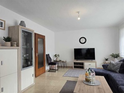 Lichtdurchflutete 3,5-Zimmer-Wohnung mit Balkon, 2 Stellplätzen und Gartenanteil