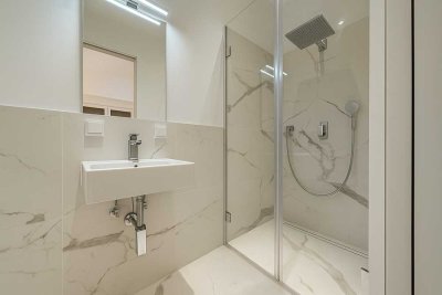 Wunderschöne Neubau-Gartenwohnung mit Terrasse. Im Hinterhaus eines gepflegten Altbaus