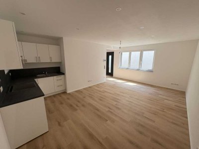 *Erstbezug* 2-Zimmer Souterrainwohnung in Römerberg