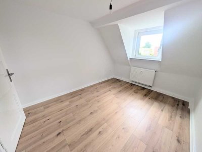 **Klein, aber fein: +frisch renoviert +neuer Laminat +neues Tageslichtbad +eigener Garten**