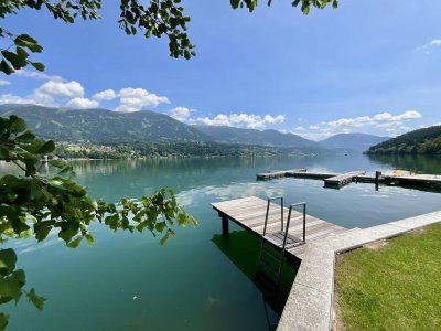 WOHNEN AM WASSER - BEGEHRT WIE NIE! EIGENTUMSWOHNUNG MIT EIGENEM SEEGRUNDSTÜCK (DIREKTER, PRIVATER SEEZUGANG) SOWIE BOOTSANLEGEPLATZ IN GIGANTISCHER NATURLAGE AM MILLSTÄTTER SEE