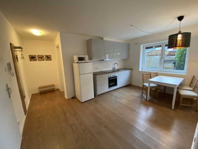 Ruhige, teilmöblierte 2-Zimmer EG Wohnung mit EBK in Brunnthal (Hofolding)