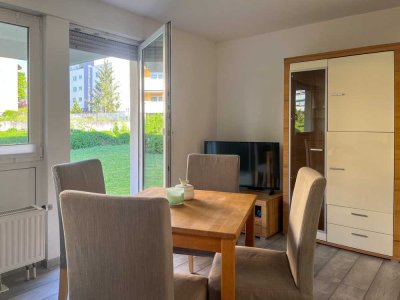 Moderne möblierte 1-Zimmerwohnung mit Terrasse und Tiefgaragenstellplatz