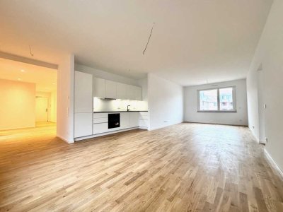 KFW55, exklusives Wohnung mit EBK, großem Balkon, Fernwärme und Tiefgarage